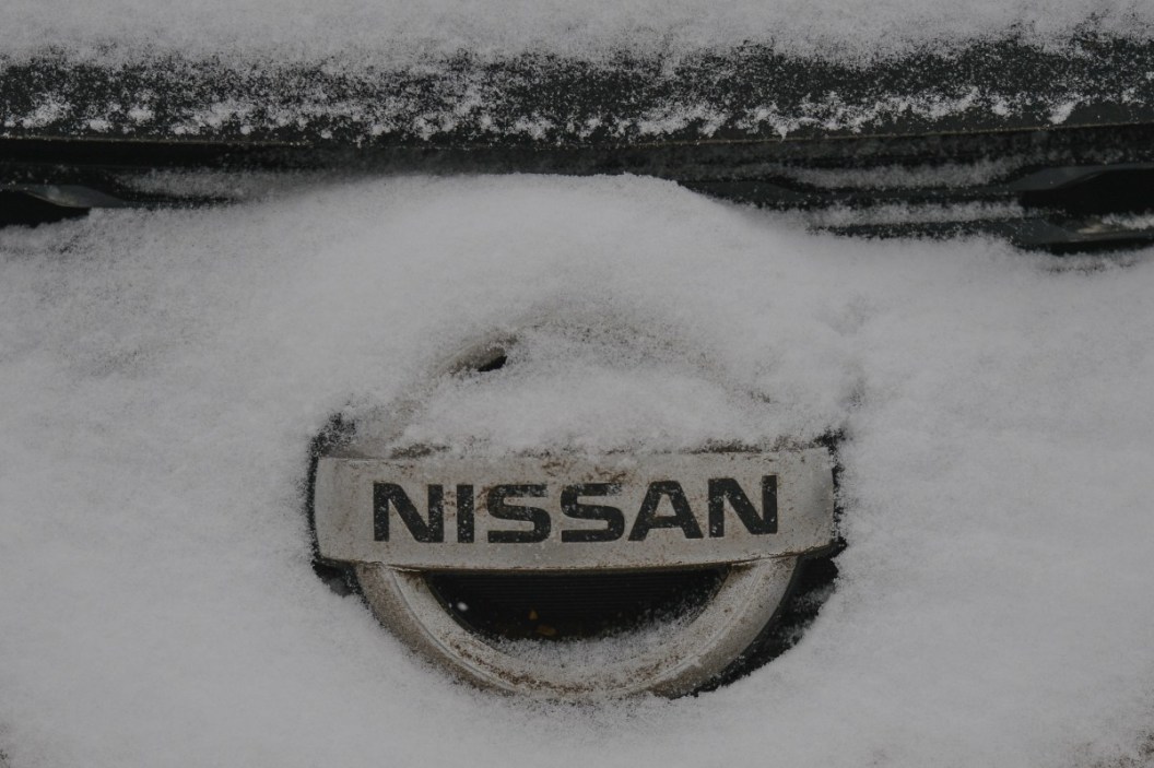 nissan logo covered in snow