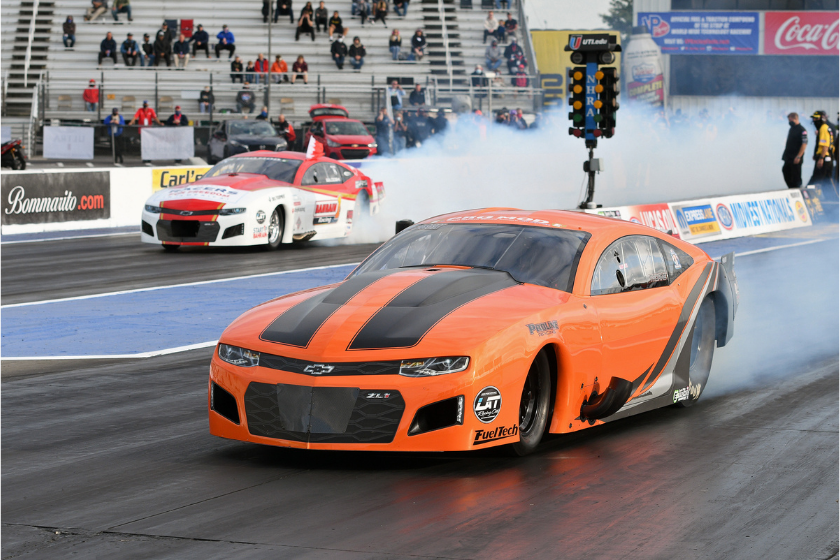 Kris Thorne Pro Mod dragster and Khalid Albalooshi Pro Mod dragster do burnouts during the Mopar Express Lane NHRA Midwest Nationals on October 2, 2020, at World Wide Technology Raceway at Gateway