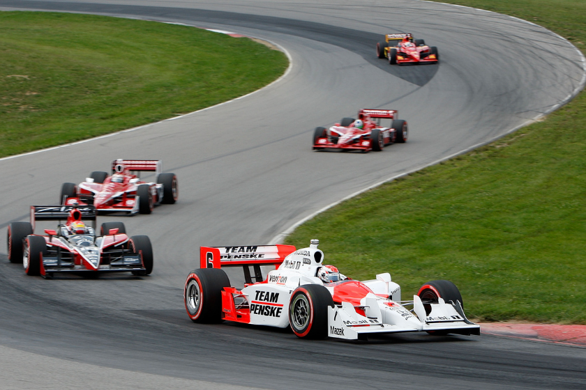 Ryan Briscoe leads a pack of cars during the IRL IndyCar Series The Honda Indy 200 at the Mid-Ohio Sports Car Course on August 9, 2009 in Lexington, Ohio