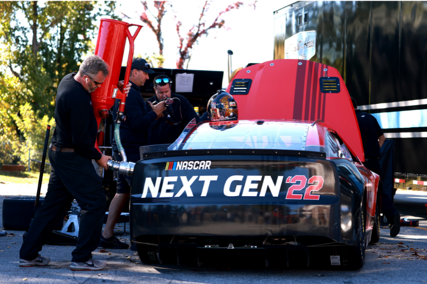Crew members prepare the NASCAR Next Gen car for a test session with Clint Bowyer at Bowman Gray Stadium on October 26, 2021 in Winston Salem, North Carolina