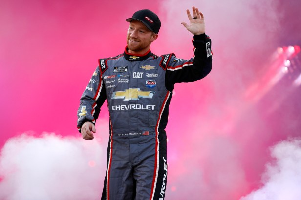 Tyler Reddick waves to fans during pre-race ceremonies prior to the NASCAR Cup Series Federated Auto Parts 400 Salute to First Responders at Richmond Raceway on September 11, 2021 in Richmond, Virginia