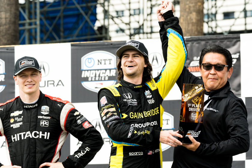 IndyCar driver Colton Herta, hand raised, wins the 2021 Acura Grand Prix Of Long Beach on September 26, 2021 in Long Beach, California