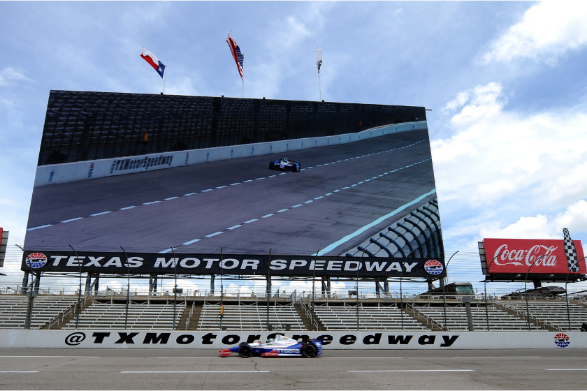 Ryan Briscoe drives in front of the Big Hoss TV during NTT DATA Qualifying for the Verizon IndyCar Series Firestone 600 at Texas Motor Speedway on June 6, 2014 in Fort Worth, Texas 