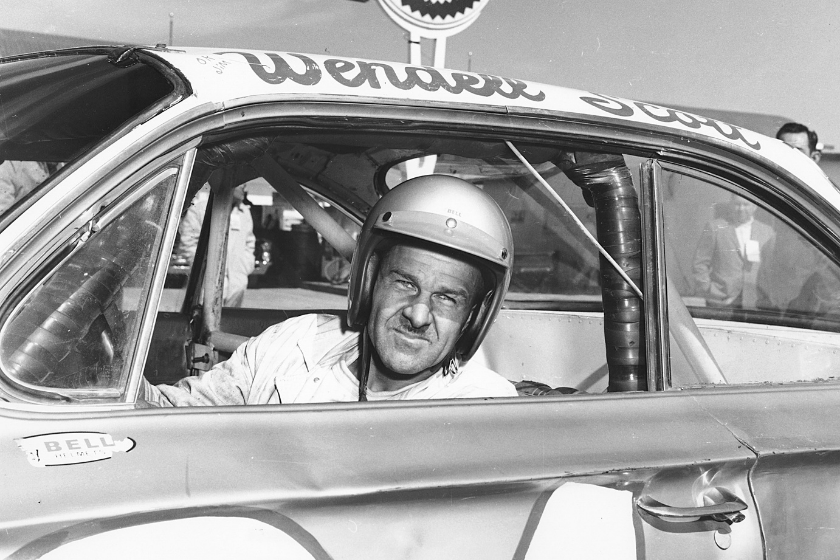 black and white photo of wendell scott inside race car