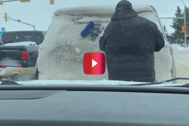 Driver Gets Frustrated With Snowy Car in Front of Him and Decides to Do Something About It