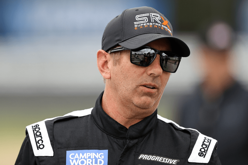 greg biffle in sunglasses and superstar racing experience hat