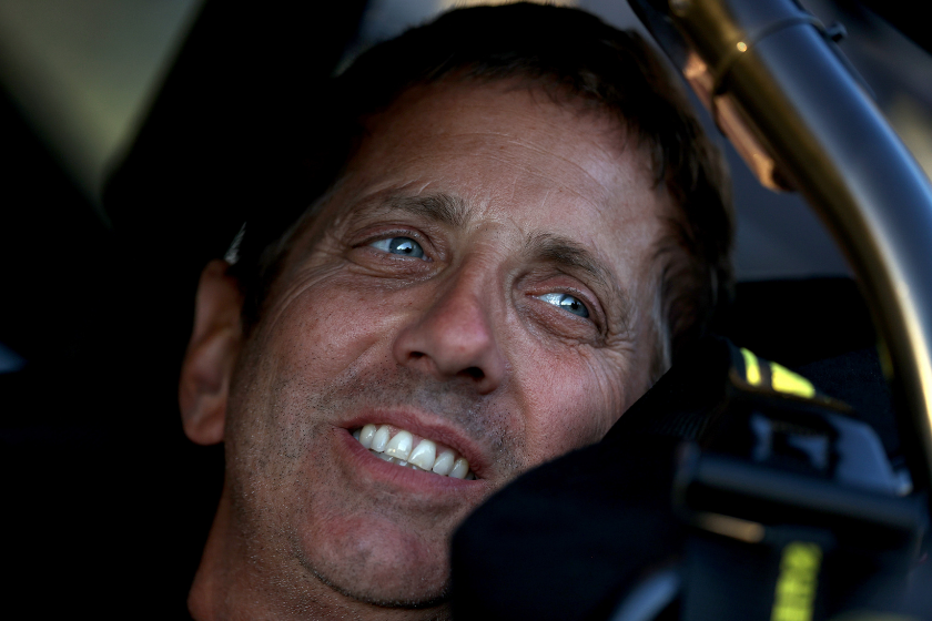 greg biffle smiling inside of race car