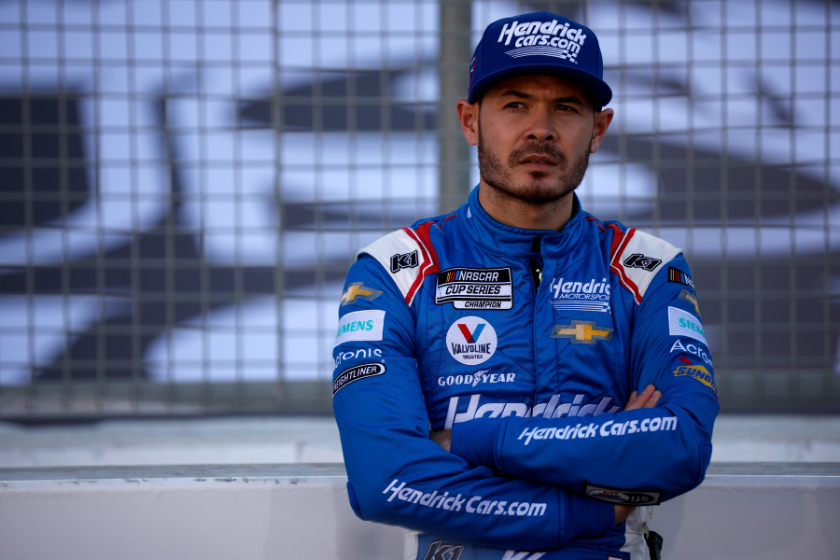 kyle larson with arms folded