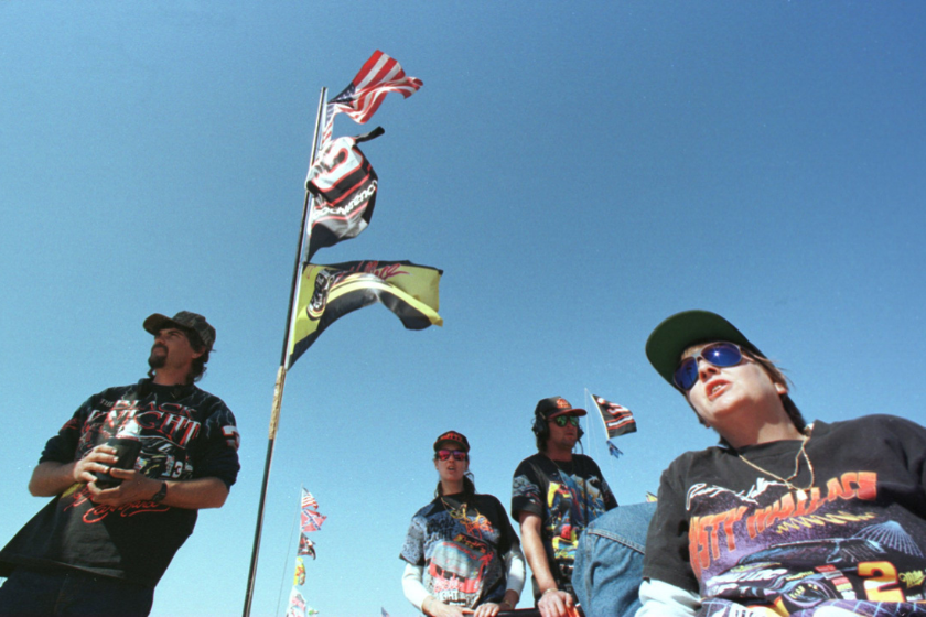 nascar fans on top of motorhome at 1996 daytona 500